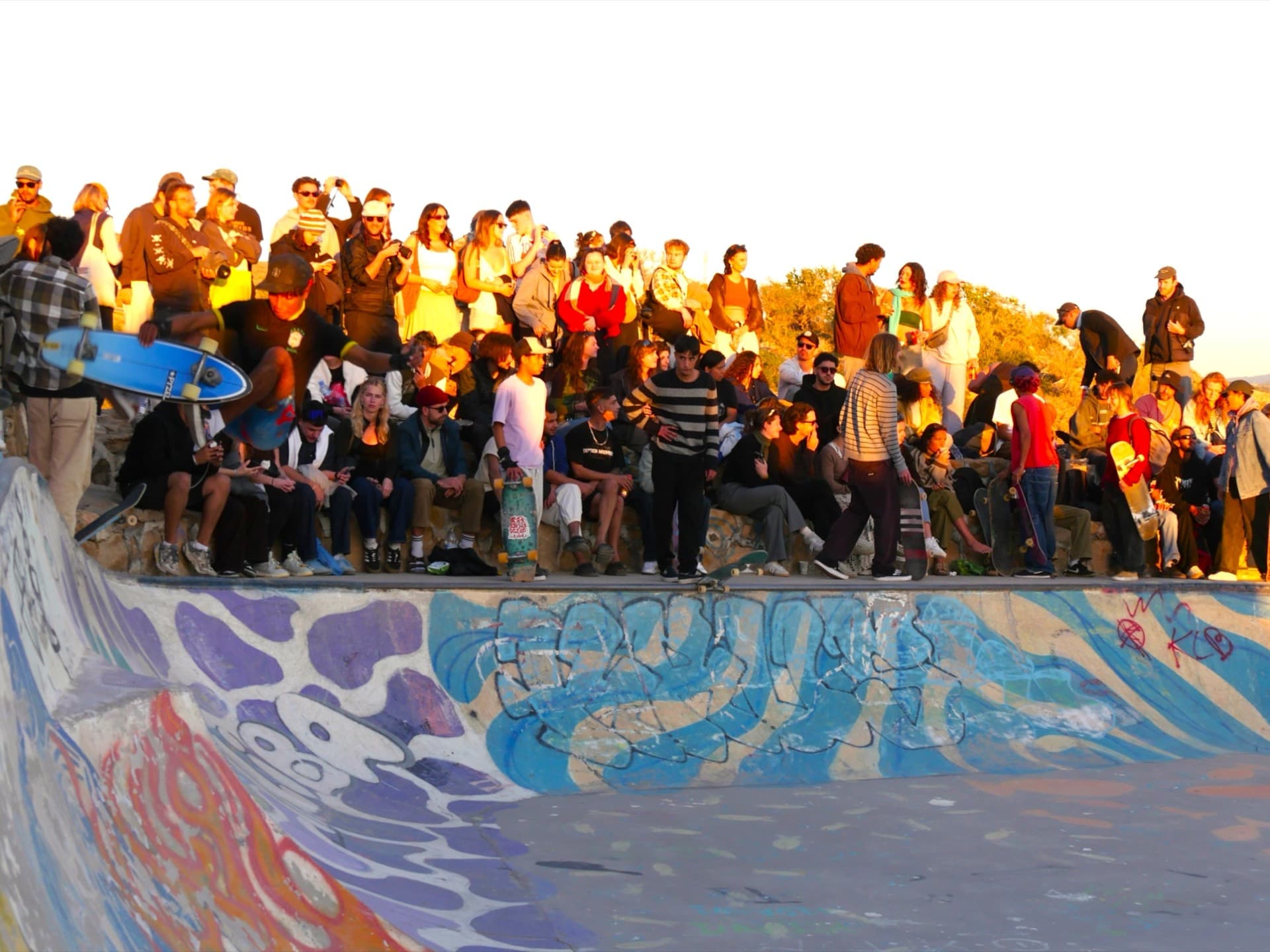 Taghazout skate park crowd at sunset
